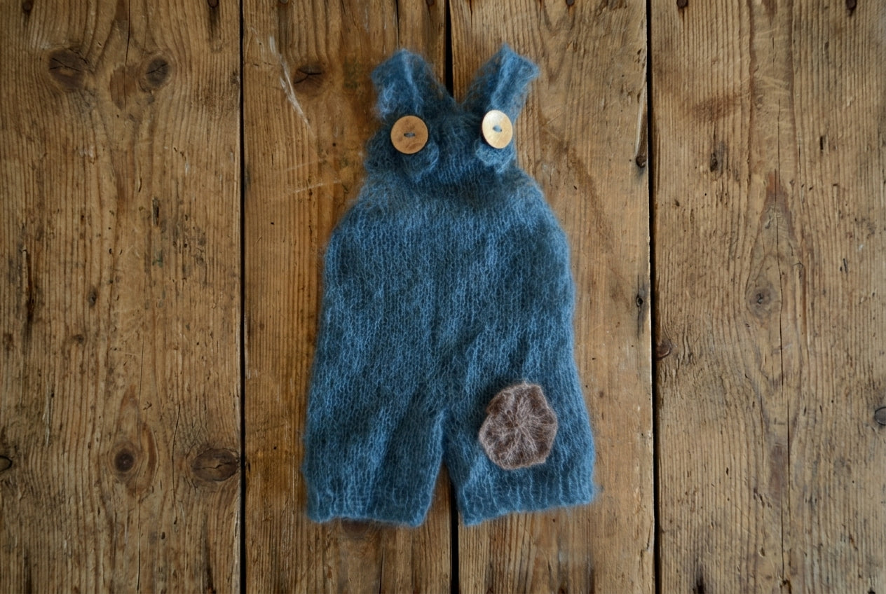 Blue knitted baby romper