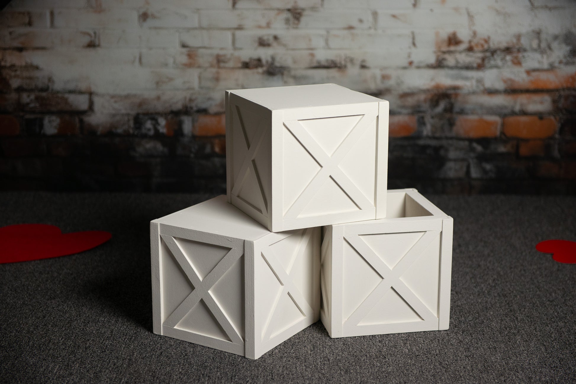 Farmhouse-Inspired Decorative Prop Cubes
Versatile wooden cubes with an X-paneled pattern in white, designed to complement rustic, farmhouse, or vintage-style photoshoots.