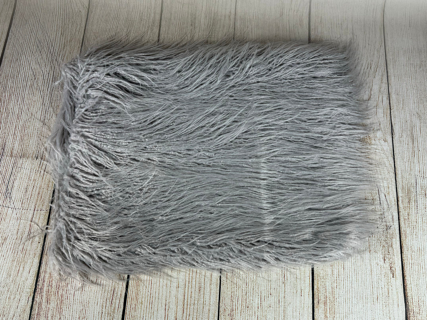 Mongolian Faux Fur - Gray 33”X19”-(AS IS ITEM)
