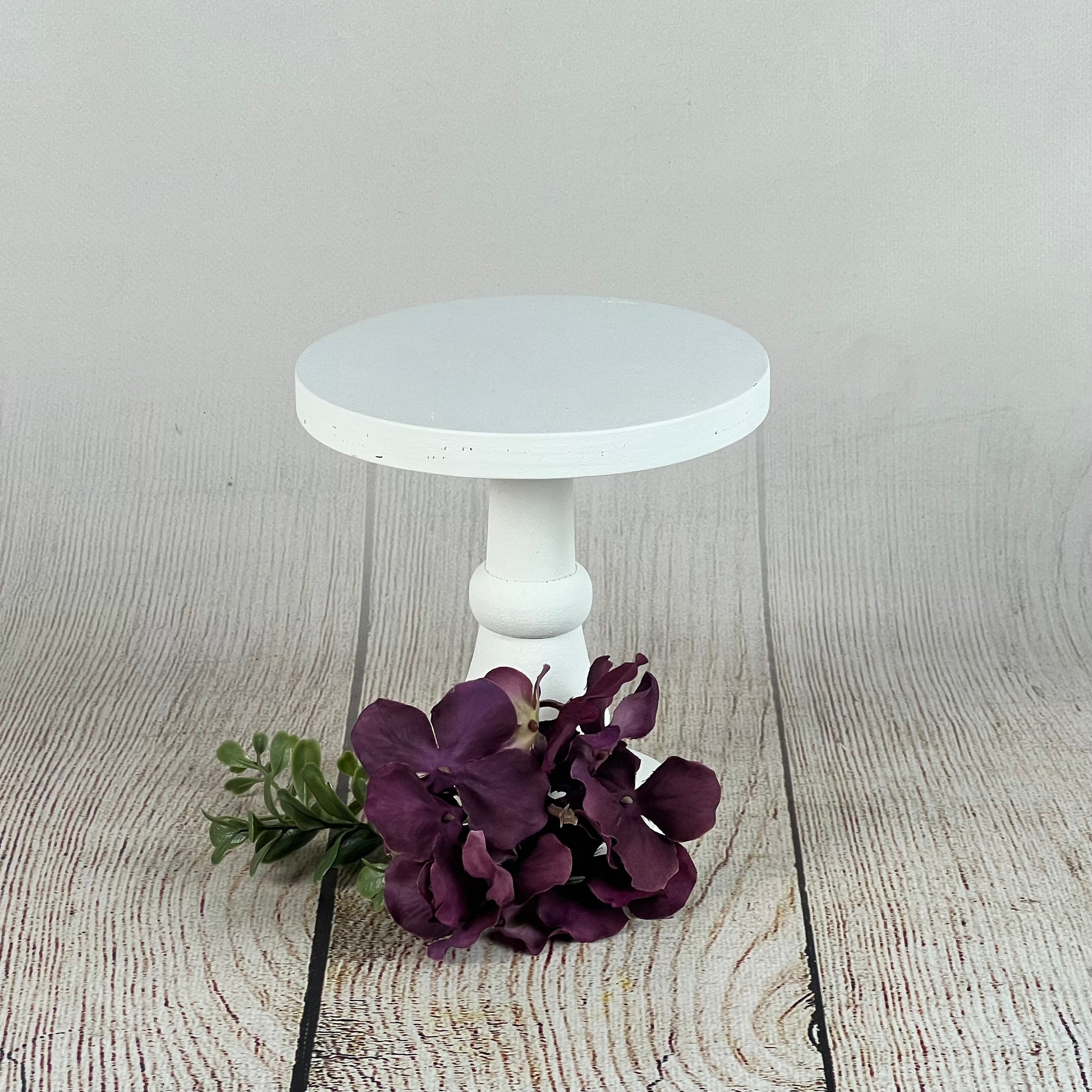 Tall white cake sales stand