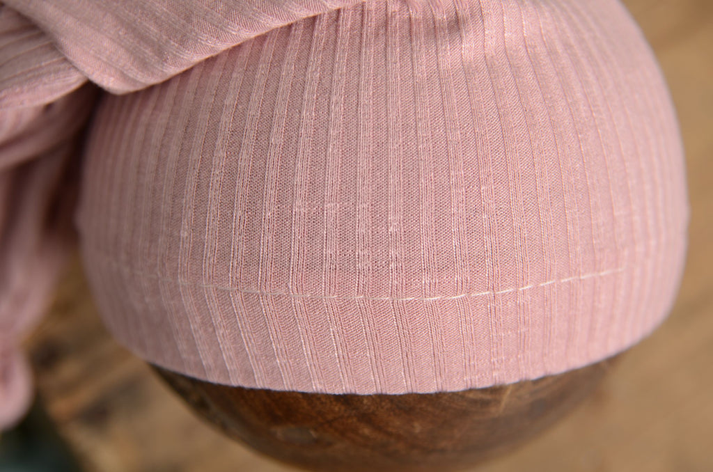 Close-up of a pink knitted hat