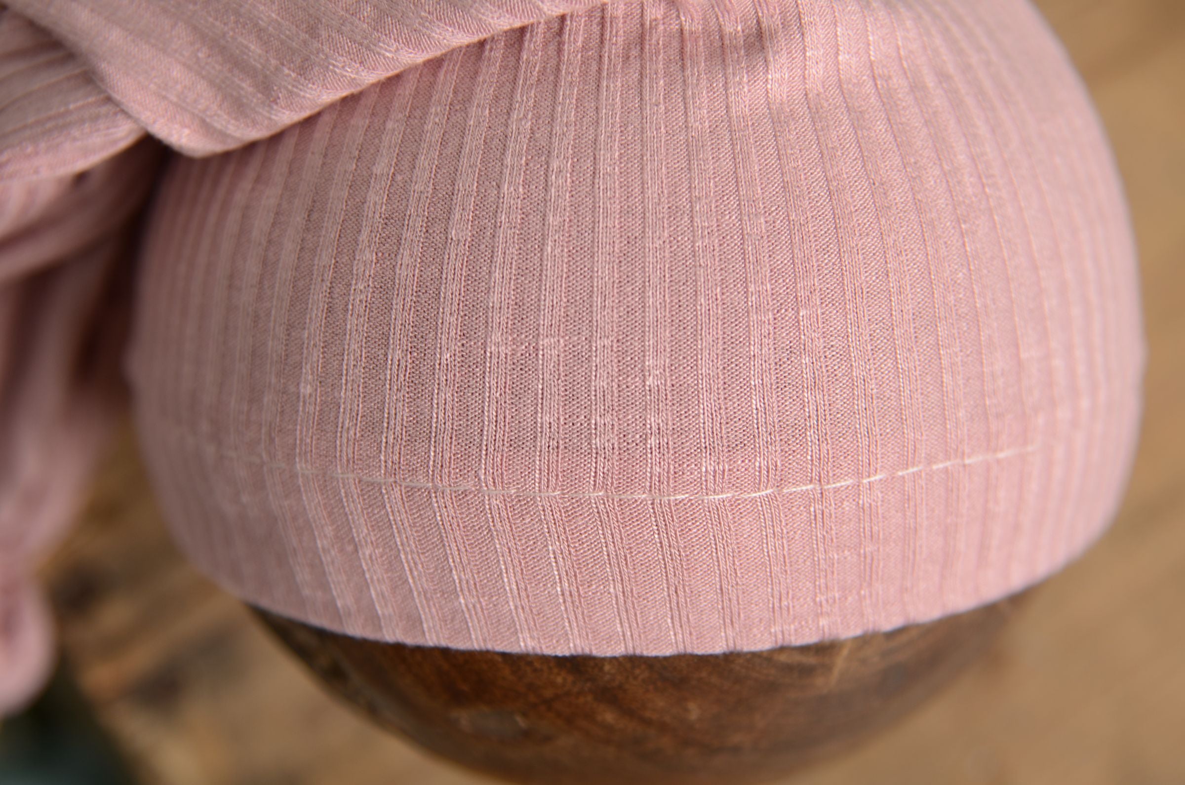 Close-up of a pink knitted hat