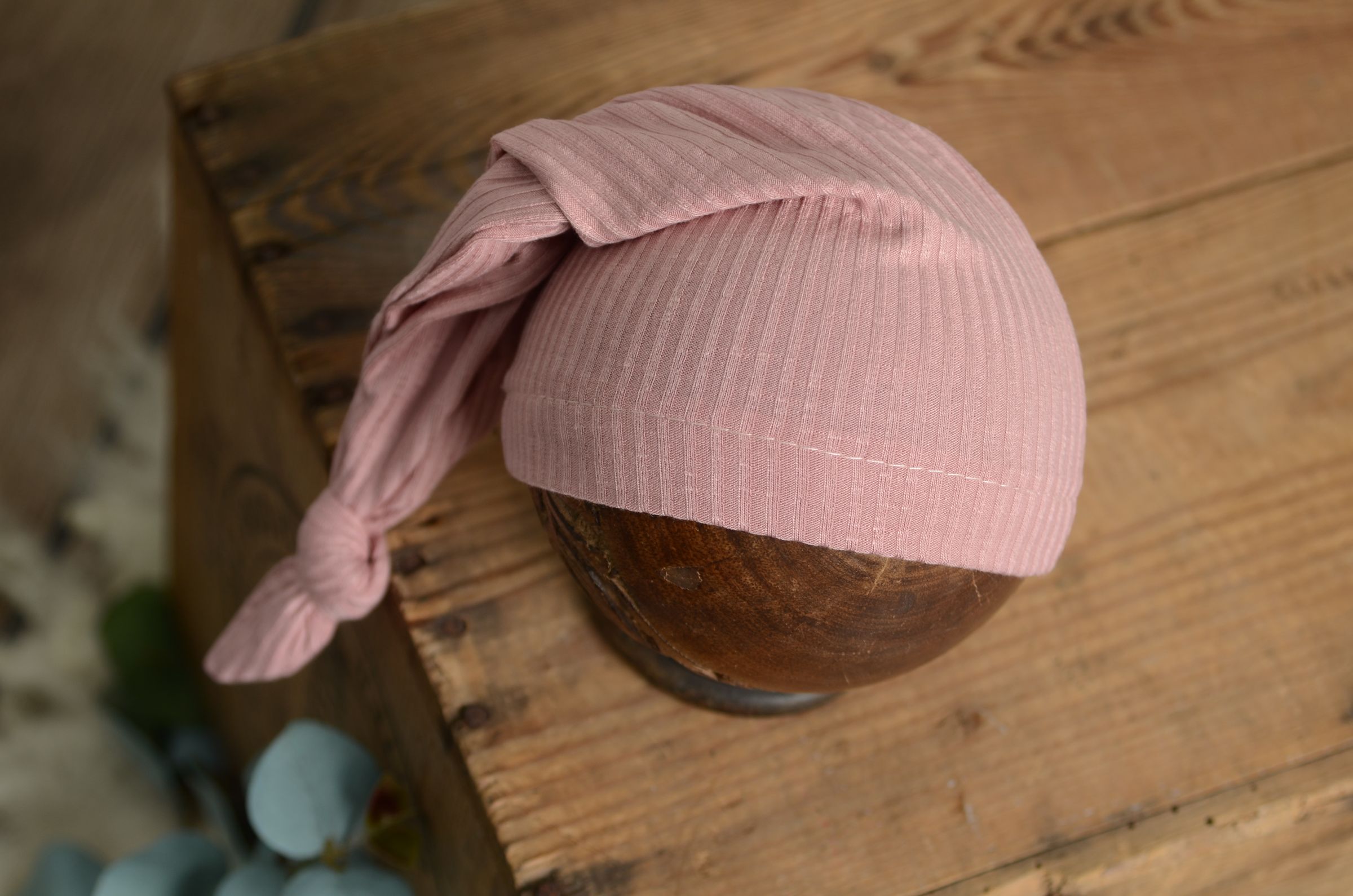 Pink ribbed beanie. Ribbed knot sleepy cap with a long knotted tail for newborn photography.