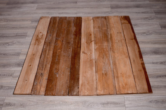 Rustic wooden photo floor panel used as a background, perfect as a newborn photography prop.