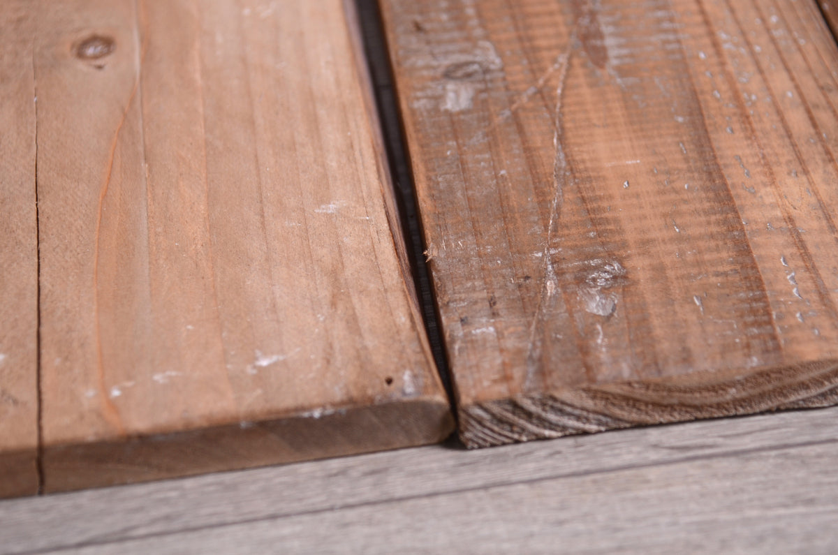 Close-up of a weathered wooden photo floor panel, a versatile newborn photography prop for timeless sessions.