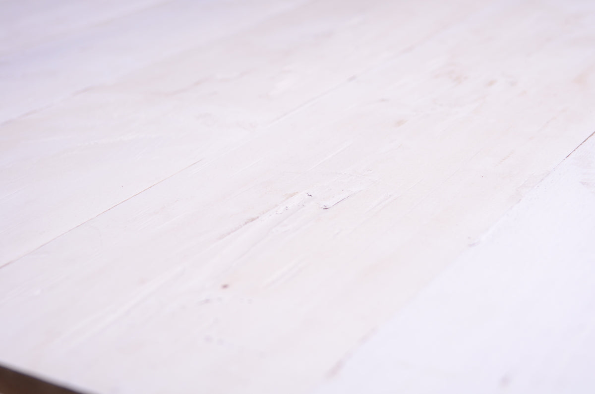 Natural wood planks with varied tones of white, creating a warm and rustic backdrop for newborn photography props.