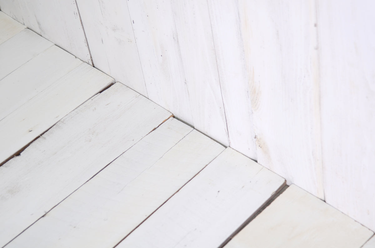 Authentic reclaimed wood backdrop and floor prop for newborn photography, adding warmth and rustic charm.