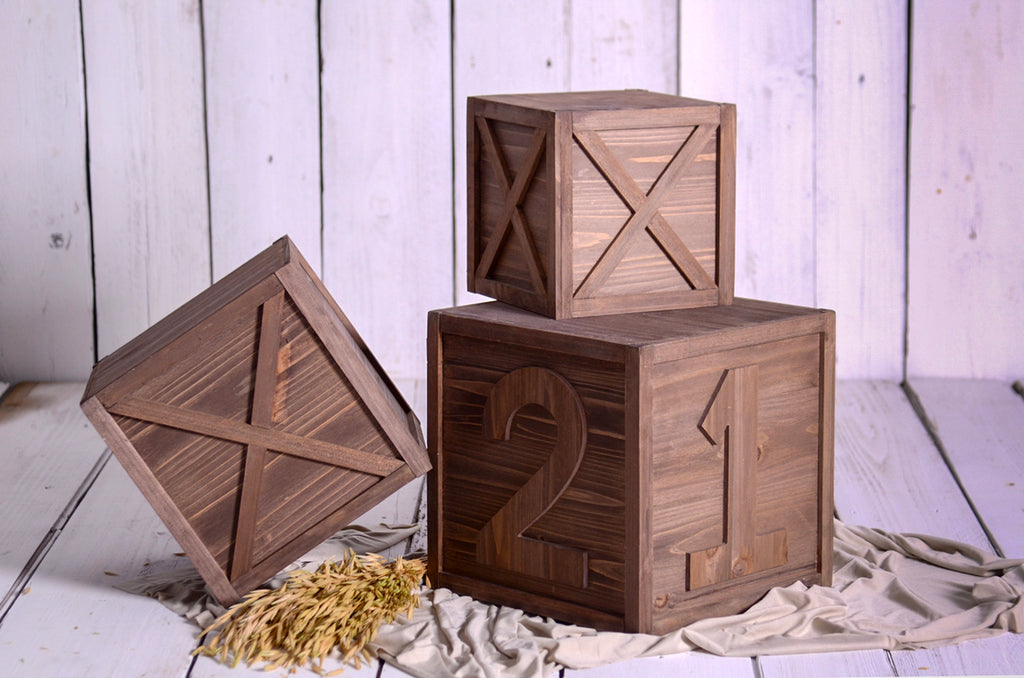 Rustic brown wooden boxes stacked with engraved numbers 1 and 2, newborn photography prop for cakesmash.