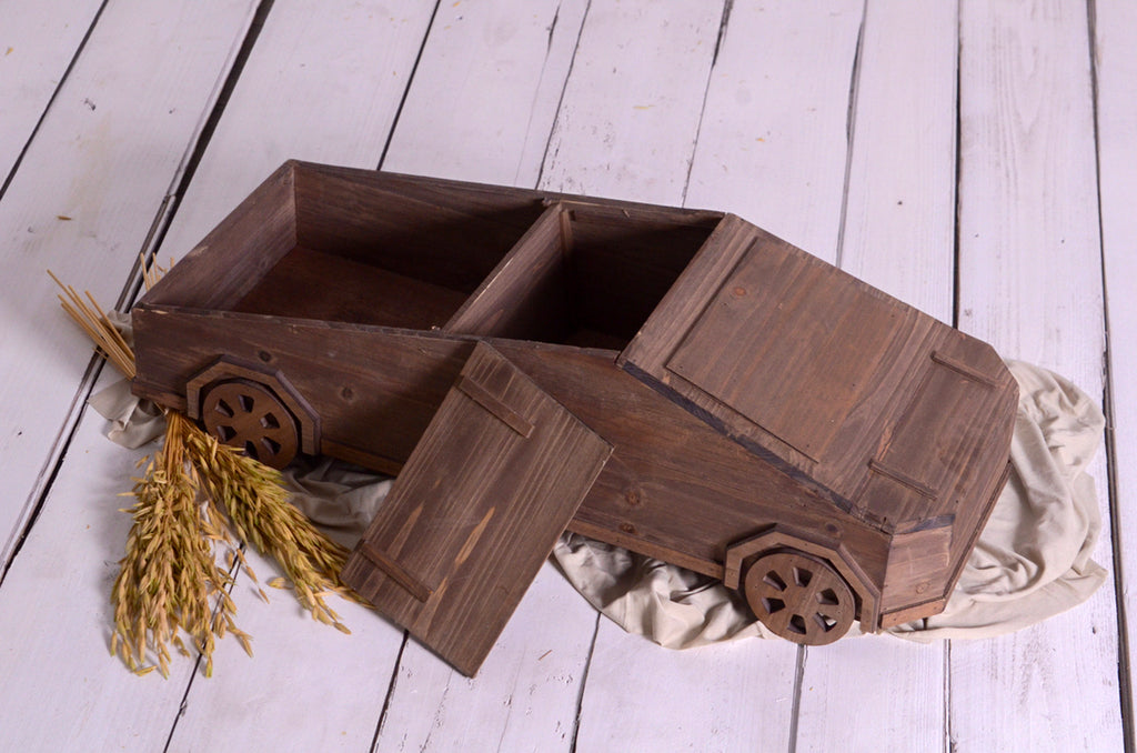 Open-top wooden tesla cyber truck newborn photography prop with dual compartments and removable lid.