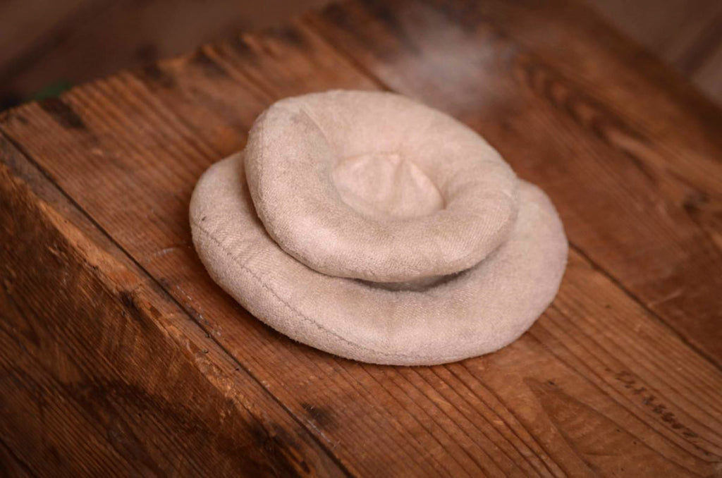 This incredible set of head support positioning pillows is one of the must-have items for every newborn photographer's studio.